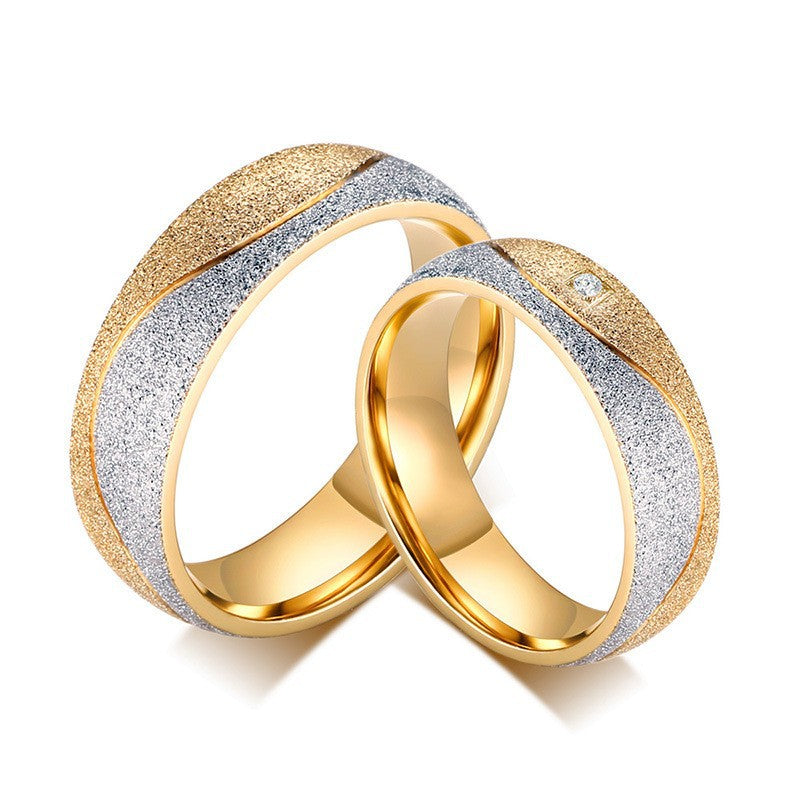 Fashionable titanium steel couple rings with gold inlaid zircon